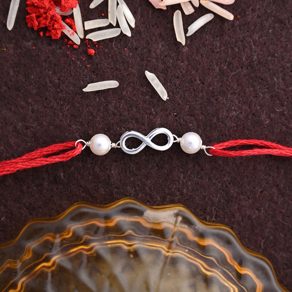 Silver Infinity Rakhi with Roli Chawal for Bhai Brothers
