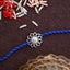 Silver Floral Rakhi with Roli Chawal for Bhai Brothers